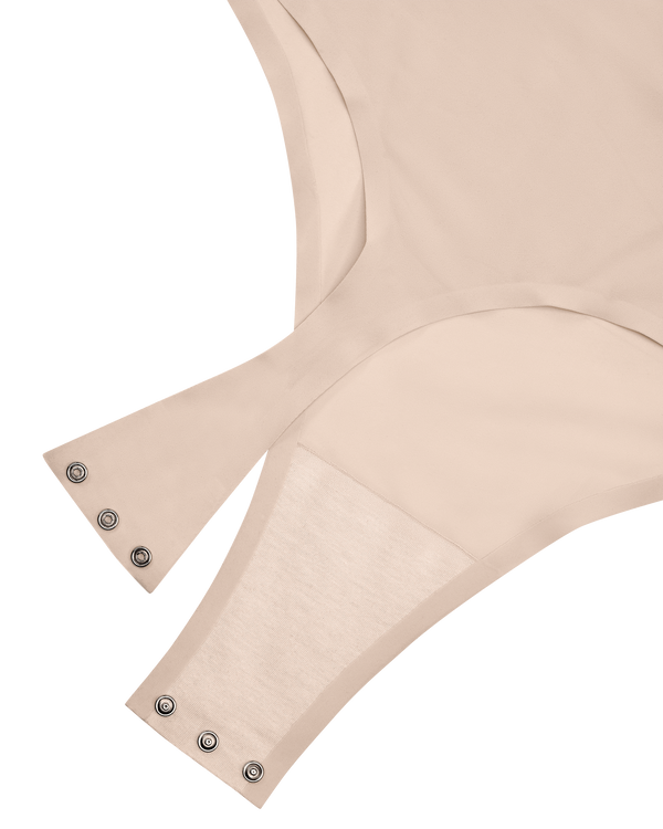 Breathable cotton sits against the skin, and press studs open so you never have to fully undress.
